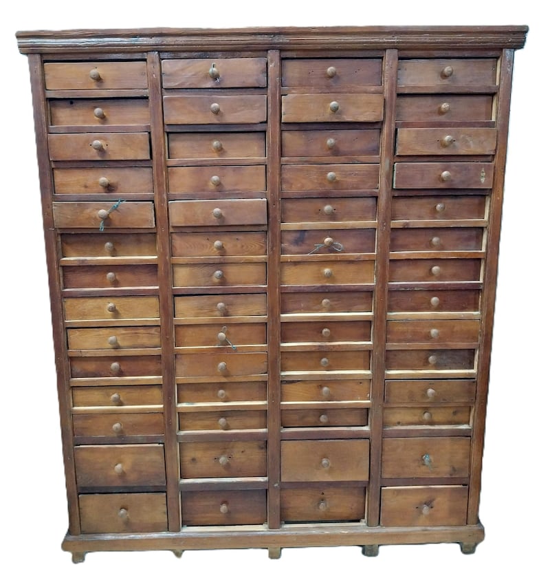 One of two 1940s set of 56 drawers in pine