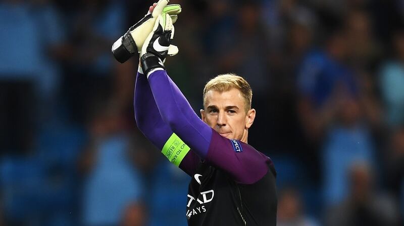 Manchester City goalkeeper Joe Hart  applauds the fans after the  Champions League playoff second leg match against Steaua Bucharest at Etihad Stadium. Photograph: Michael Regan/Getty Images
