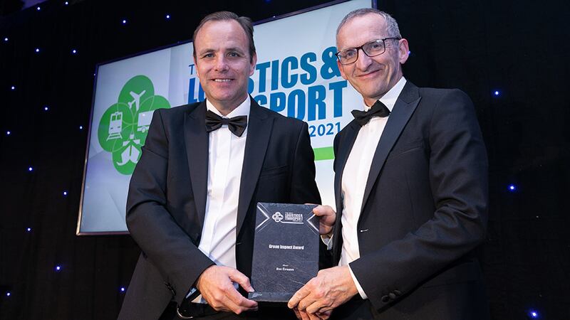 Martin Kelly, Senior Relationship Manager at AIB Corporate Banking, presents the Green Impact Award to Rory Leahy, Bus Éireann.