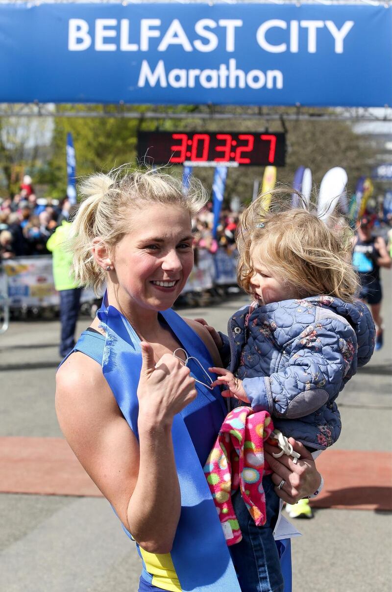 Laura Graham with her daughter Darcy after the Belfast City Marathon in 2016. Photograph: Andrew Paton/Presseye
