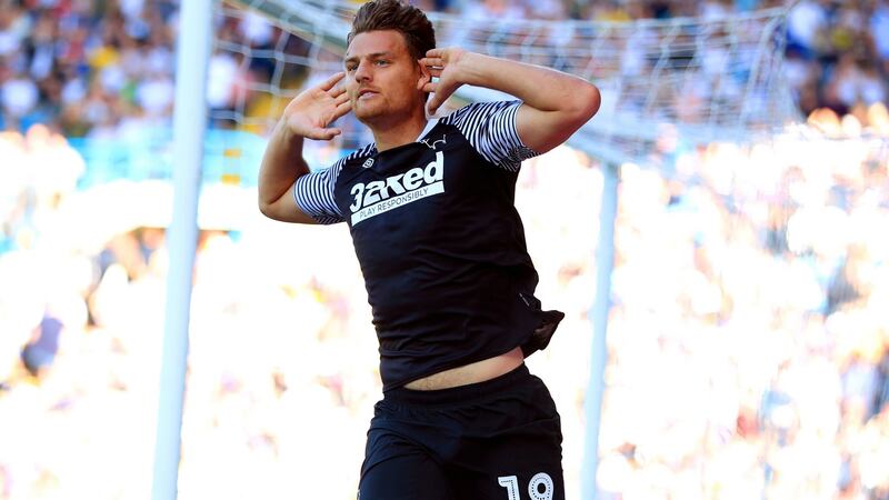 Derby County’s Chris Martin celebrates scoring his side’s late equaliser during the Championship match against Leeds United at Elland Road. Photograph: Mike Egerton/PA Wire