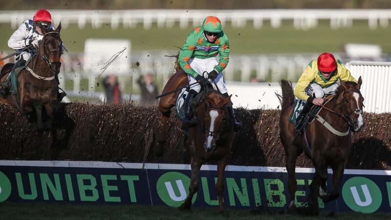 Patrick Mullins riding Rathvinden (left) clears the second last before winning The National Hunt Challenge Cup Amateur Riders’ Novices’ Chase at Cheltenham last year. Photograph:  Alan Crowhurst/Getty Images
