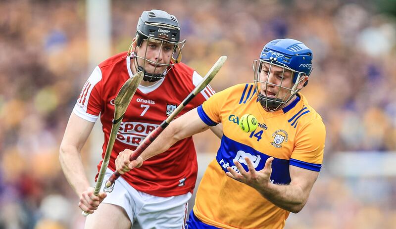 Clare's Shane O'Donnell with Robert Downey of Cork in close attendance. O'Donnell has made a valuable contribution this season. File photograph: Inpho