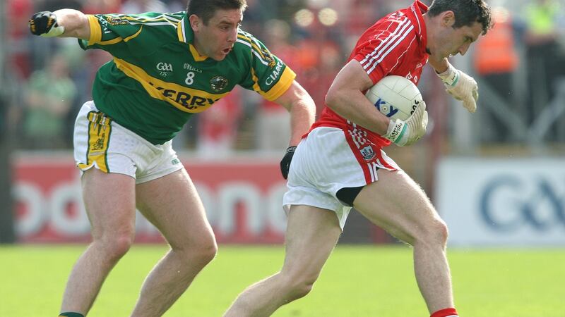 Darragh Ó Sé in action against Cork’s Graham Canty in 2006. Photograph: Lorraine O’Sullivan/Inpho