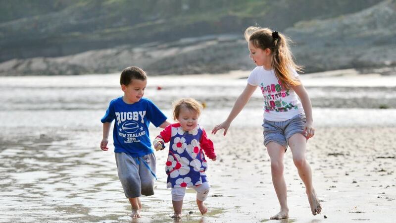 Cian (5), Mia (1) and Bunty Kenny (9) Gurranebraher pictured in The Irish Times on March 27th, 2012 enjoying the sunshine in Roberts Cove, Co Cork this time last year. Photograph:  Daragh Mc Sweeney/Provision