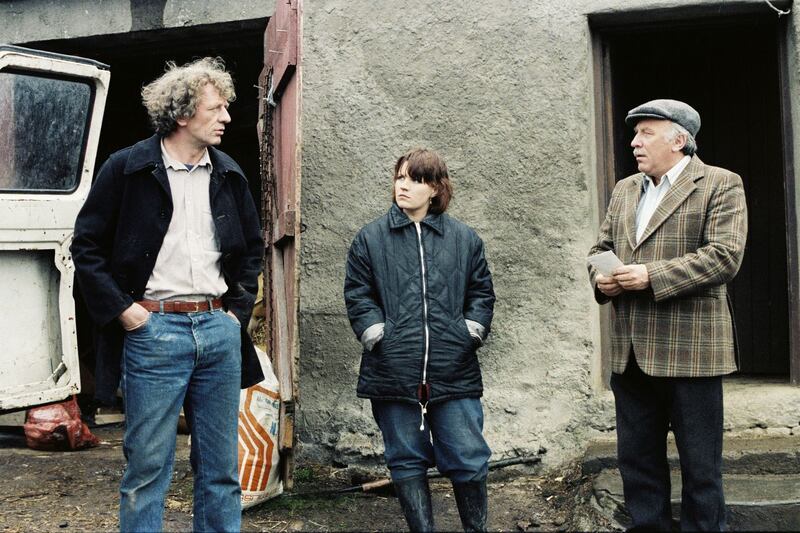1984: Miley Byrne (Mick Lally), Biddy McDermott (Mary McEvoy) and Dinny Byrne (Joe Lynch) on the farm in the  fictional rural village of Glenroe, Co Wicklow. Photograph: John Rowe/RTÉ