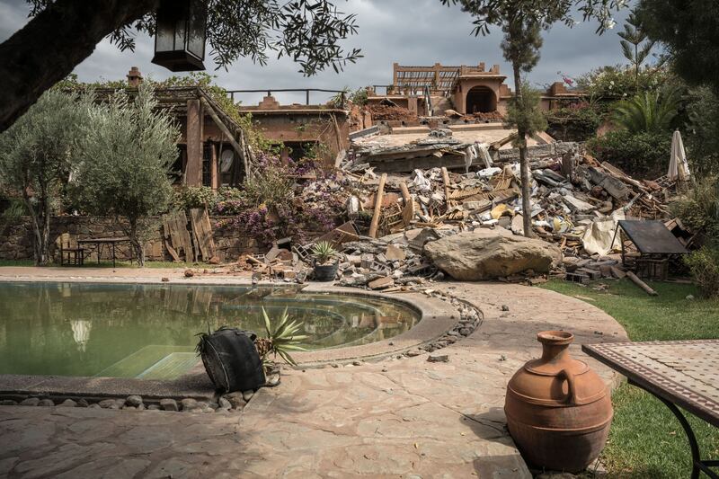 A destroyed wall  at the Chez Momo II hotel in Ouirgane. Photograph: Sergey Ponomarev/New York Times
                      