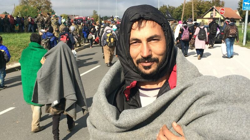 Abal Lakam al-Wardi, a maths teacher from Syria, on his way from the Croatian border to a makeshift camp for migrants at Dobovo, Slovenia. Photograph: Daniel McLaughlin