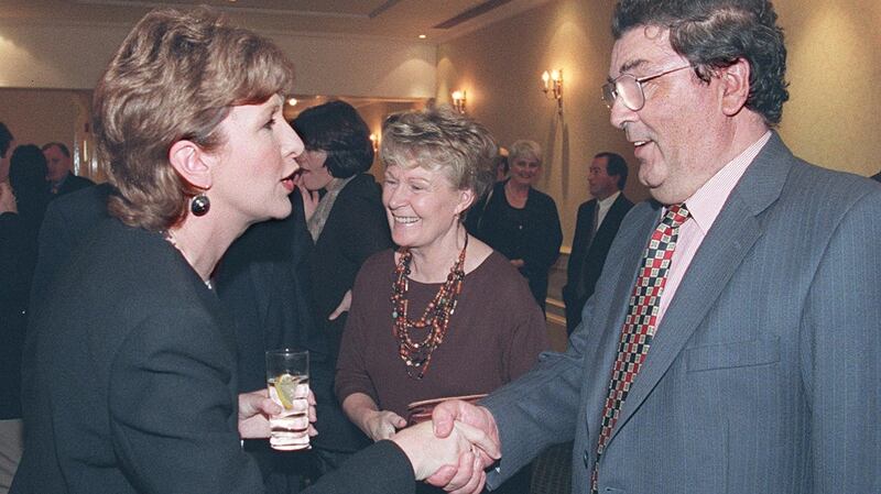Mary McAleese shakes hands with Mr John Hume at the SDLP 25th annual dinner in the Burlington Hotel, Dublin, 1997. Photograph: David Sleator