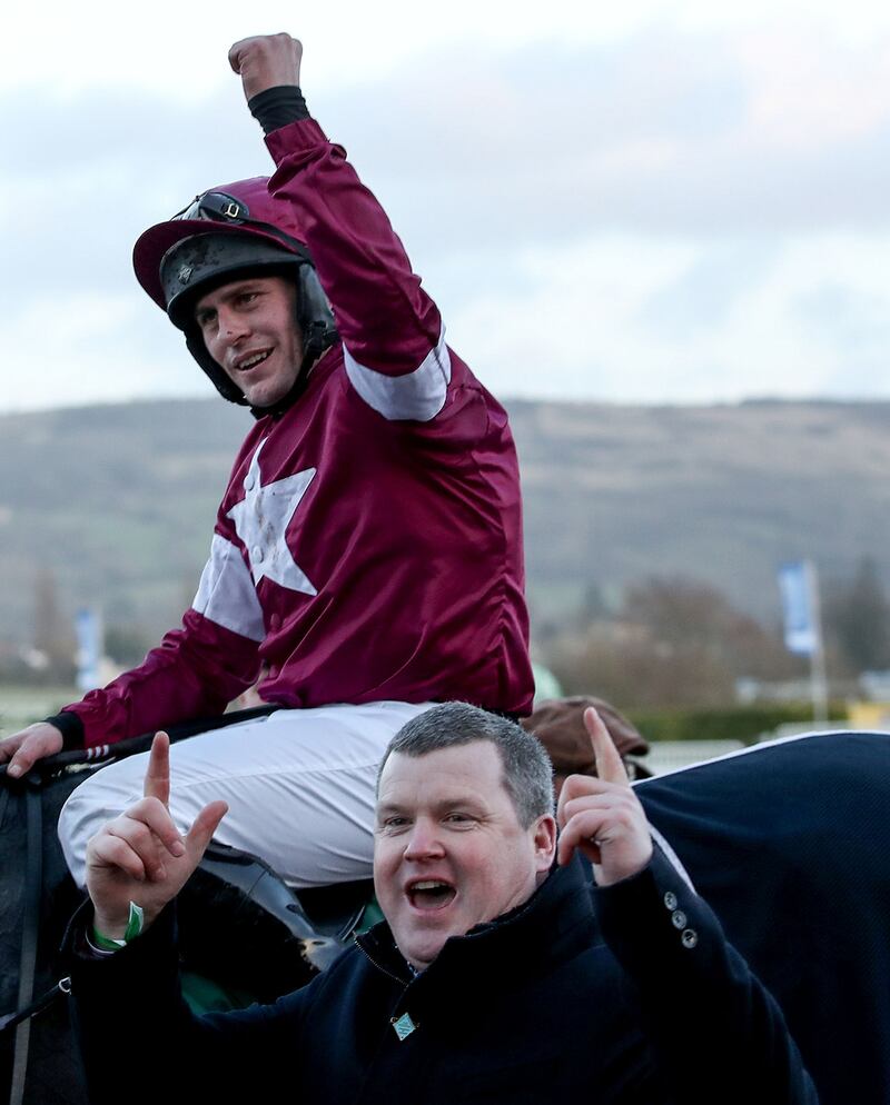 Happier times: Jockey Rob James celebrates Cheltenham success with trainer Gordon Elliott after winning aboard Milan Native. File photograph: Inpho