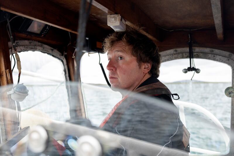 John Ó Flatharta, skipper of Golden Adventure, takes his fishing boat, filled with local families, to St MacDara’s Island for Lá Fhéile Mhic Dara.
Photograph: Chris Maddaloni/The Irish Times