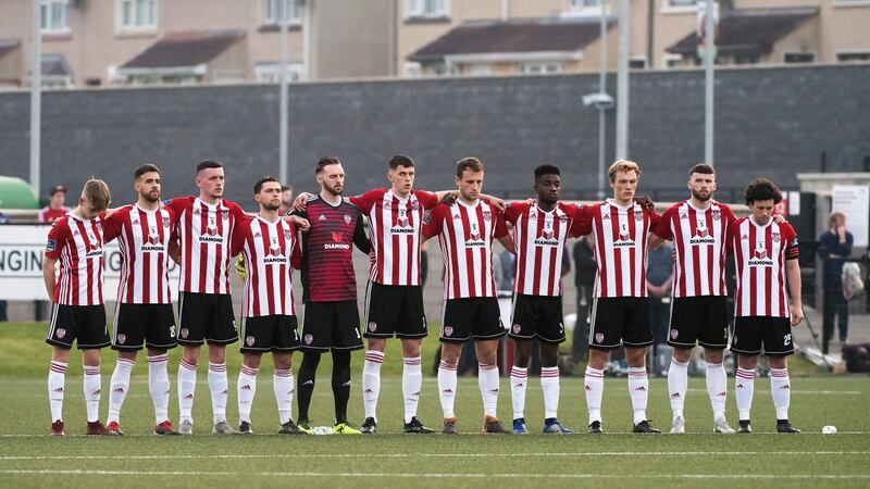 Derry City players during  a minute’s silence for journalist Lyra McKee who was shot dead in the city on Thursday night. Photograph:  Evan Logan/Inpho