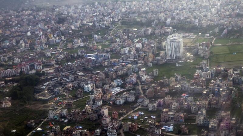 This aerial picture taken on April 27th, 2015 shows earthquake-hit buildings in Kathmandu. Hundreds of thousands spent another night in the open on after a massive earthquake killed more than 4,000, with officials warning the final toll could rise sharply once rescuers reach cut-off areas. Photograph: AFP/Getty Images