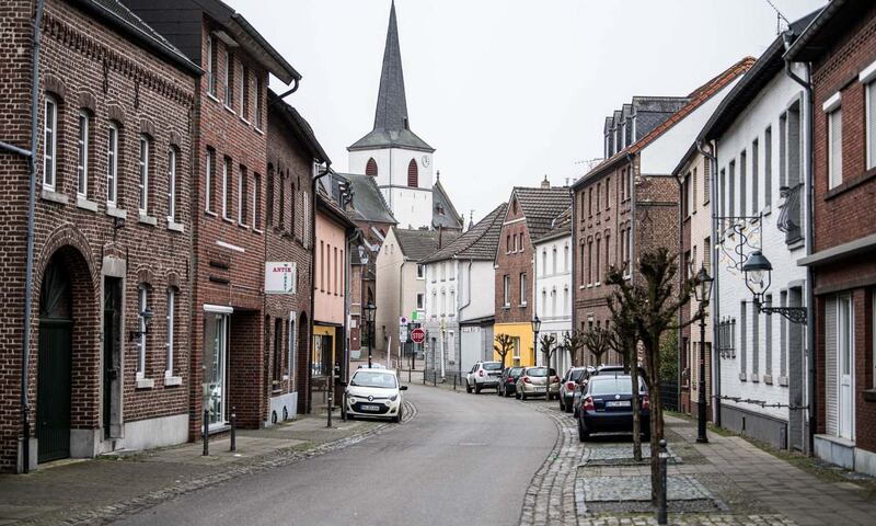 Coronavirus clusters:  a deserted main street in Gangelt, Germany. Photograph: Lukas Schulze/Getty