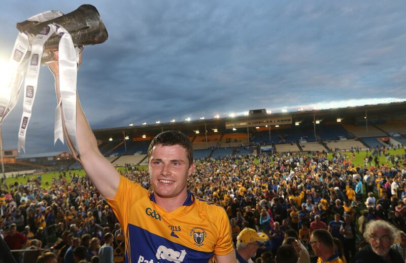 Clare captain Paul Flanagan lifts the trophy after the Munster U21 Final win over Tipperary in 2013. Photograph: James Crombie/Inpho