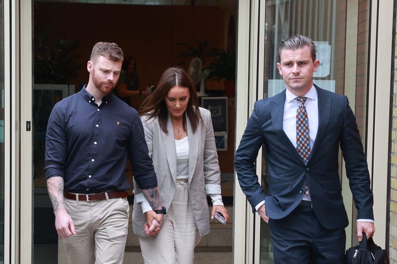 Natasha McCloskey, Private Sean Rooney's mother, and her husband Paul McCloskey (left), and solicitor Darragh Mackin outside Dublin District Coroner's Court for an inquest review hearing into the death of Pte Rooney, who was killed while serving in Lebanon when his UN peacekeeping convoy was attacked in 2022. Photograph: Liam McBurney/PA Wire