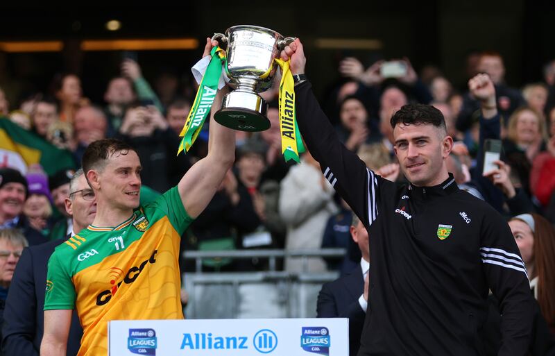 Donegal’s Ciarán Thompson and captain Patrick McBrearty lifting the trophy. Photograph: James Crombie/Inpho
