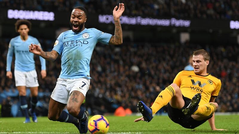 Sterling is taken down by Ryan Bennett for the penalty. Photo: Michael Regan/Getty Images