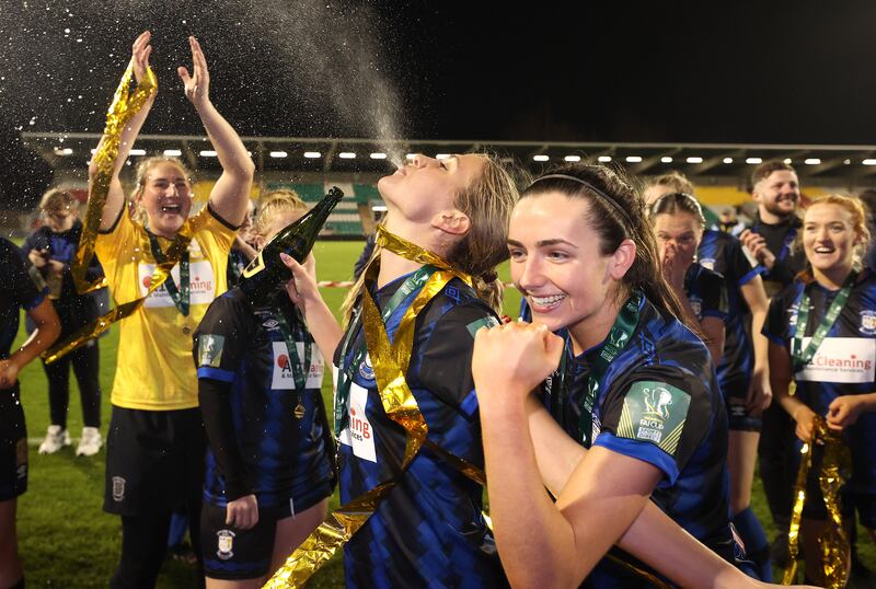 Madison Gibson and Chloe Singleton celebrate Athlone Town's FAI Women's Cup final victory over Shelbourne in Tallaght Stadium in November. Photograph: Bryan Keane/INPHO
