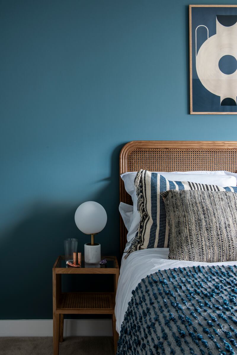 Darker tones can evoke a cosy and luxurious ambience. Bedroom by Optimise Design