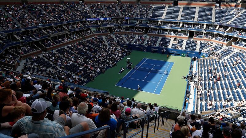 Fans keep mostly to the shaded areas of the stadium to escape the heat as they watch Sloane Stephens play Anhelina Kalinina. Photo: EPA