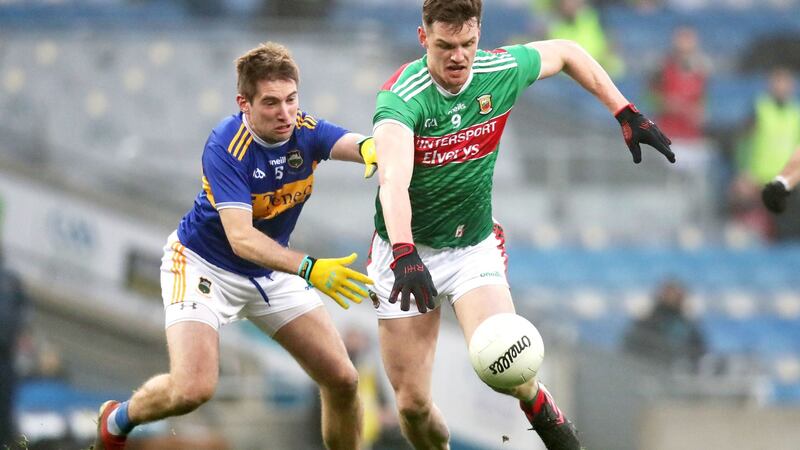 Tipperary’s Bill Maher and Matthew Ruane of Mayo in the All-Ireland SFC semi-final at Croke Park on December 6th. Photograph: Bryan Keane/Inpho