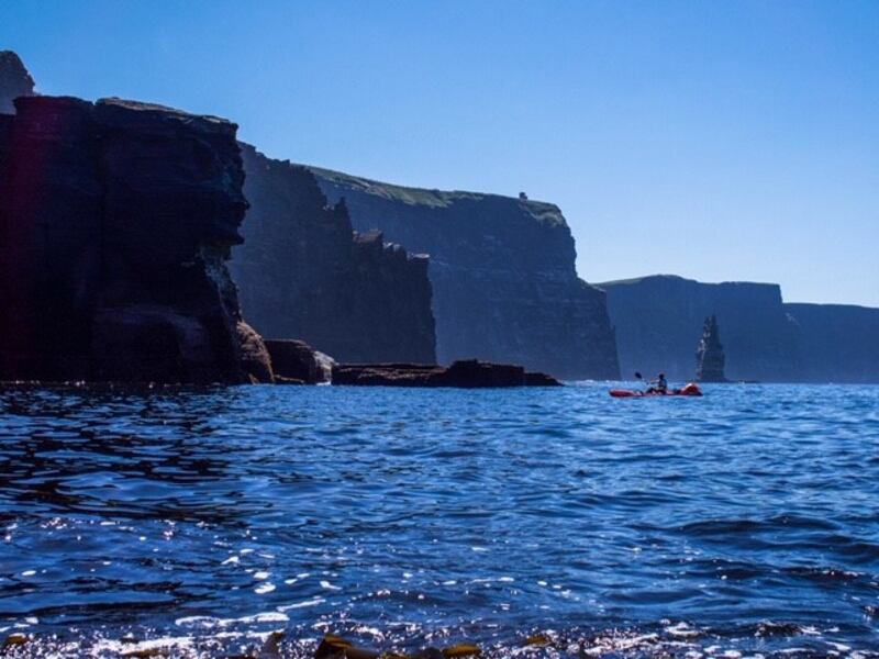 1.02pm, June 28th: My friend Conal Byrne and I kayaked from Doolin to O’Brien’s Tower on the hottest day of the year at 32 °C, the highest June temperature recorded in Ireland since 1976.  Conal is paddling past O’Brien’s tower close to Aileen’s, the big wave surf spot.  A high pressure system had brought good weather and very calm seas, conditions which are needed to kayak this close the cliffs. These days are rare which makes them extra special. Viewing the cliffs from the water gives you a unique perspective and makes you appreciate their huge scale.