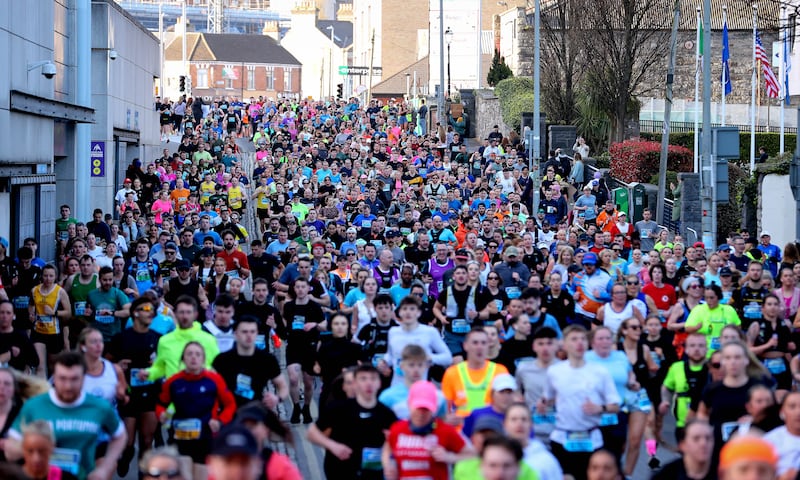 Like All-Ireland day: Runners follow the route along Jones' Road, past GAA HQ. Photograph: Ryan Byrne/Inpho