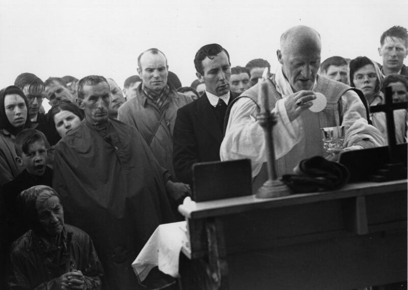 August 16th, 1947: The Archbishop of Tuam celebrates Mass atop Croagh Patrick with his congregation of all ages in Co Mayo. Photo by Merlyn Severn/Picture Post/Hulton Archive/Getty Images