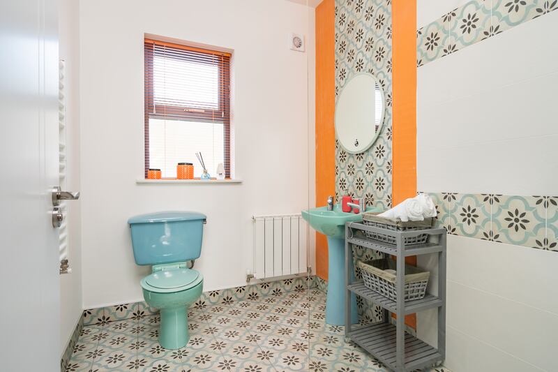 One of the two-tone coloured bathrooms suites 