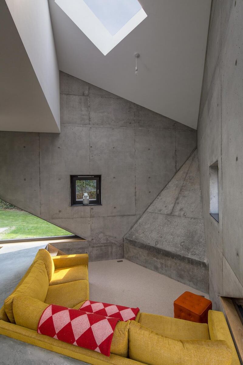 The ‘conversation pit’ sitting room, with custom-made sofa