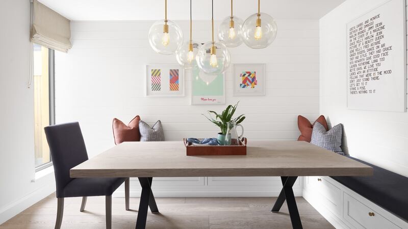 Banquette seating at the home of Vogue Williams by Arlene McIntyre of Ventura Design.