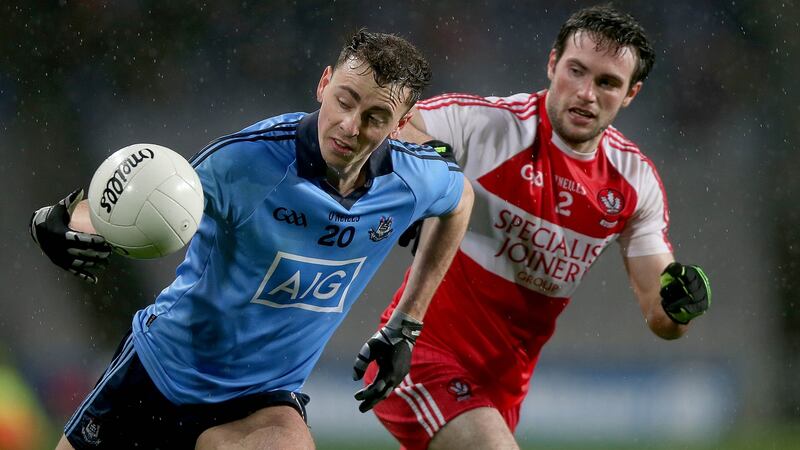 Allianz Football League Division 1 28/3/2015Dublin vs DerryCormac Costello of Dublin with Oisin Duffy of DerryMandatory Credit ©INPHO/Donall Farmer