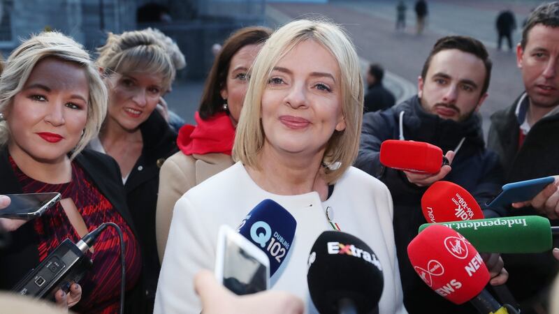 Sinn Féin candidate Liadh Ní Riada, watched by the party’s deputy leader Michelle O’Neill (left), speaks to the media as she arrives at Dublin Castle. Photograph : Niall Carson/PA Wire