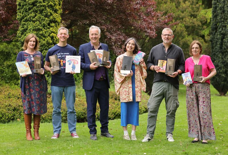 KPMG Children’s Books Ireland Awards 2024: Chair of the judges panel Áine McGillicuddy with winners Thomas Docherty, John Dougherty, Clara Kumagai, Brian Conaghan and Serena Molloy. Photograph: Alan Betson