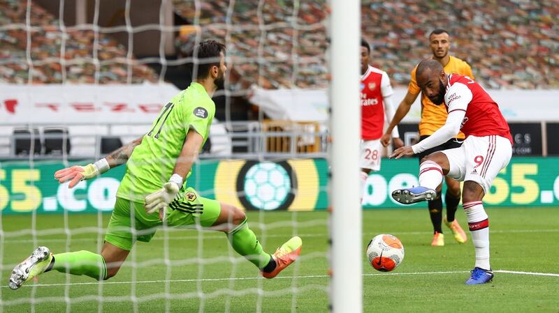 Alexandre Lacazette doubles Arsenal’s lead in their 2-0 win over Wolves. Photograph: Michael Steele/EPA
