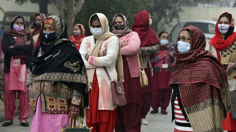 People waiting for a  vaccine  in Gurugram, India. An ambitious vaccination campaign aims to inoculate 300m Indians by the end of August. Photograph: Sanjeev Verma/Hindustan Times via Getty Images