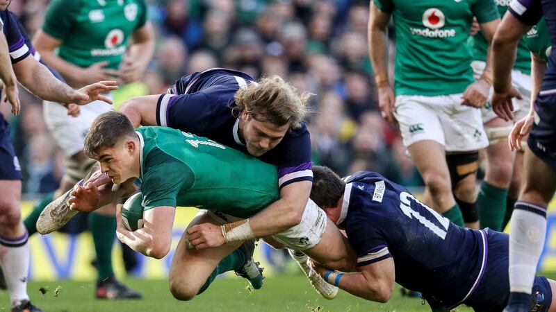Ireland’s Garry Ringrose tackled by David Denton and Pete Horne of Scotland. Photograph: Tommy Dickson/Inpho