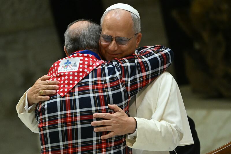 Pope Leo XIV hugs a pilgrim to the Vatican during a service last month. In his first Apostolic Exhortation, the pope emphasises the duty of Christians to serve the poor. Photograph: Filippo Monteforte/AFP/Getty