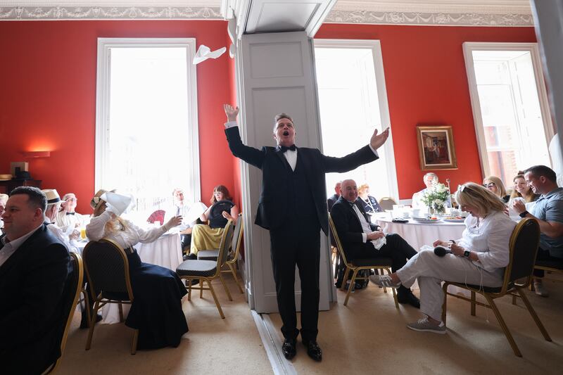 Simon Morgan sings for the audience at the Bloomsday breakfast in Belvedere College, Dublin. Photograph: Dan Dennison