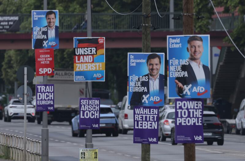 Election posters of the far-right Alternative for Germany (AfD) political party and of the socially-liberal Volt party hang from lampposts in Berlin, Germany ahead of the European Elections. Photograph: Sean Gallup/Getty Images