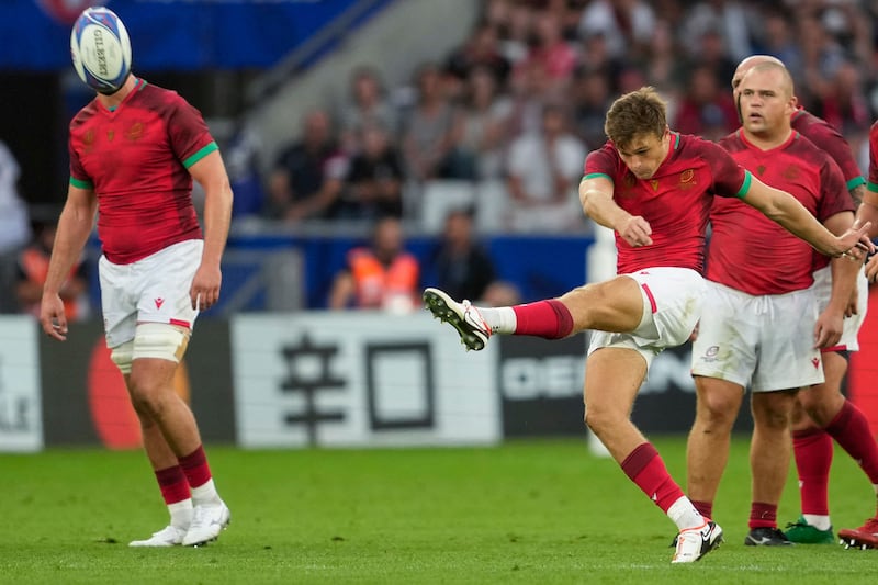 Portugal's outhalf Jeronimo Portela kicks the ball during Pool C match against Australia. Photograph: Francis Bompard/AFP via Getty Images