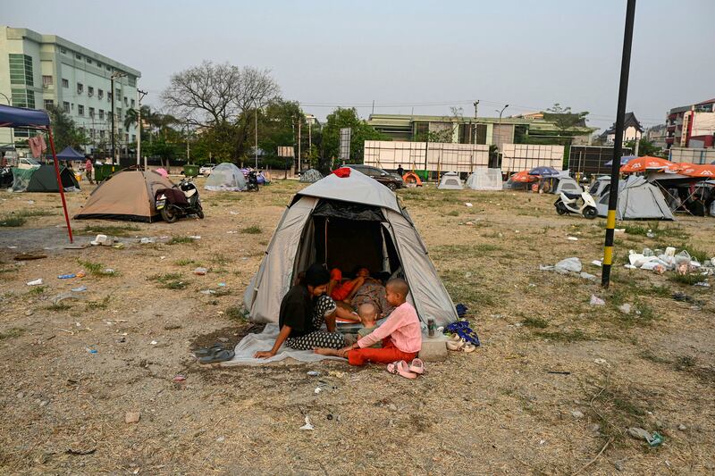 Residents take shelter in a makeshift tent camp in Mandalay. Photograh: Sai Aung Main/AFP via Getty Images        