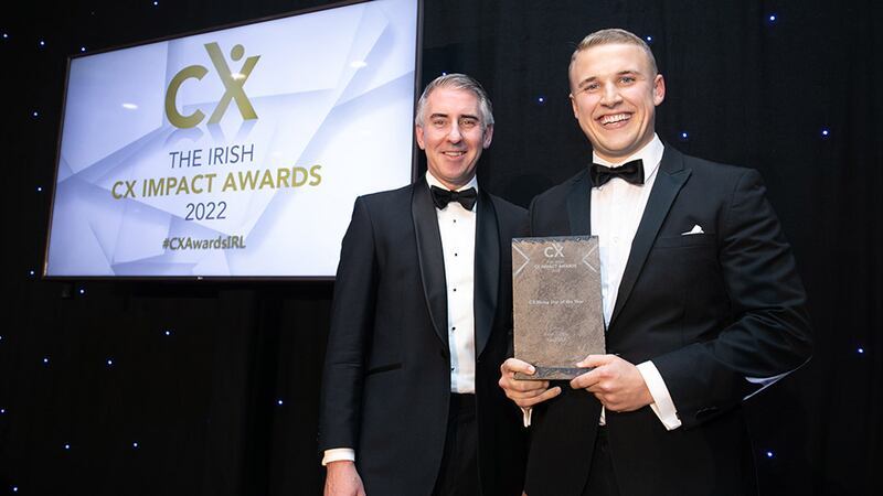 Paul Allen, awards judge, presents the CX Rising Star of the Year award to Evan Cotter, Rural WiFi.