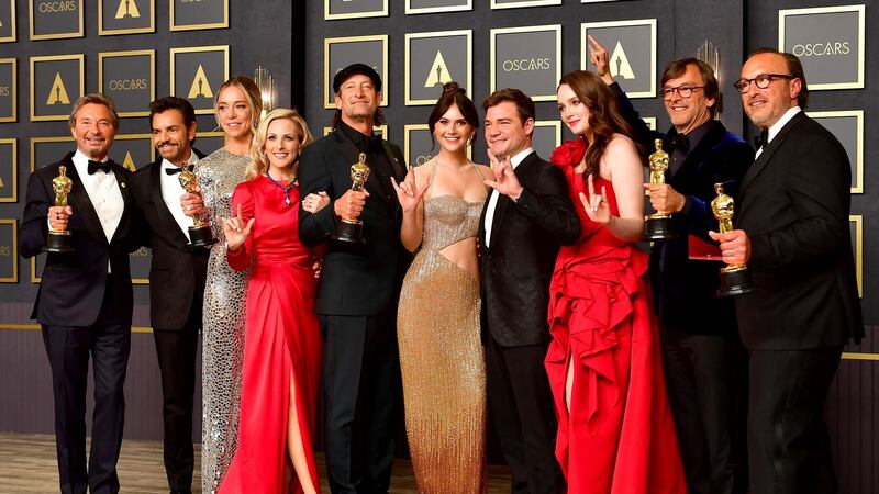 Emilia Jones, Daniel Durant, Sian Heder, Marlee Matlin, Eugenio Derbez, Fabrice Gianfermi, Patrick Wachsberger, Justin Maurer, Troy Kotsur, Amy Forsyth, and Philippe Rousselet, winners of the Best Picture award for CODA. Photograph: Frederic J Brown/AFP via Getty Images