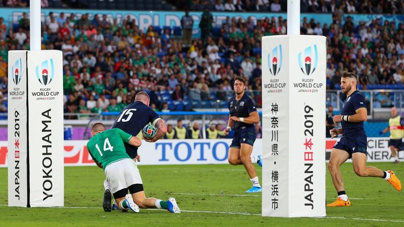 Conway tackles Stuart Hogg behind his own line to force a five yard scrum. Photo: Craig Mercer/Inpho