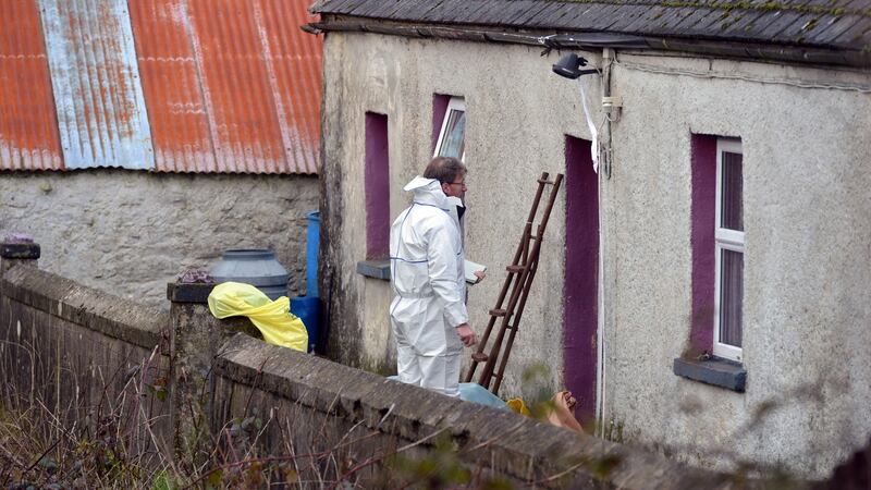 Gardaí on the scene where Paddy Lyons was murdered at  his home in  Ballysaggart, Co Waterford. Photograph: Michael Mac Sweeeney/Provision
