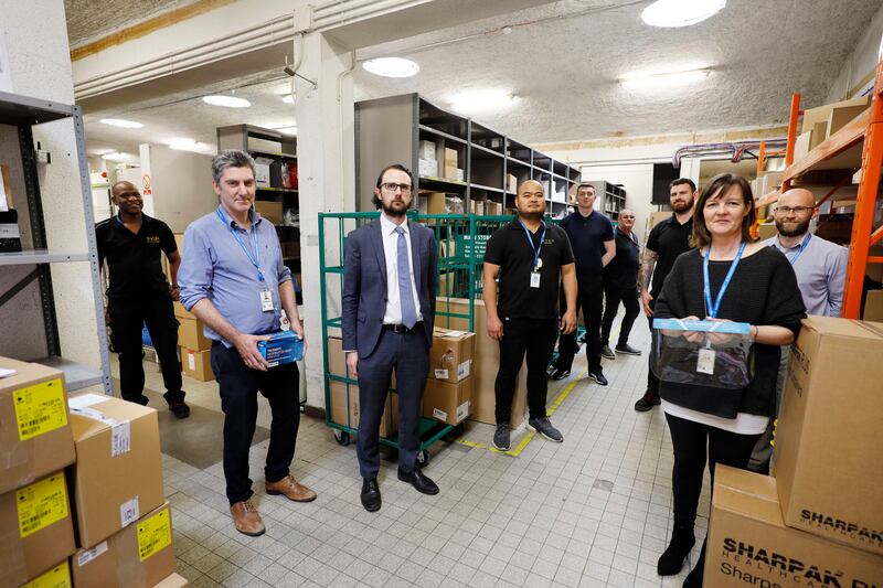 2.02pm: Michael O’Sullivan, head of procurement, with the team in his department. Photograph: Alan Betson
