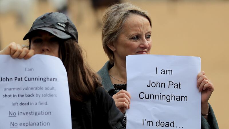 Supporters of John Pat Cunningham hold a counter-protest, as supporters of former British soldier Dennis Hutchings march in London. Photograph: Gareth Fuller/PA Wire