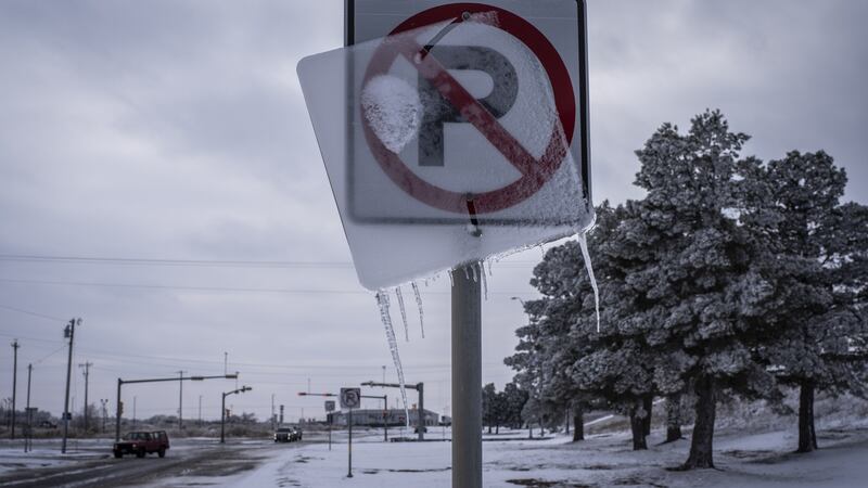 Ice coats a road sign in Midland, Texas,  on Monday. Photographer: Matthew Busch/Bloomberg